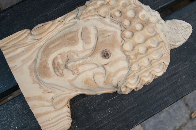 How to Carve a Face in Wood (Andres Arango/Demand Media)